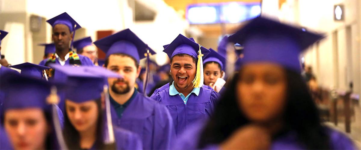 Apply for Graduation at Minneapolis College Student in line to graduate, 2019