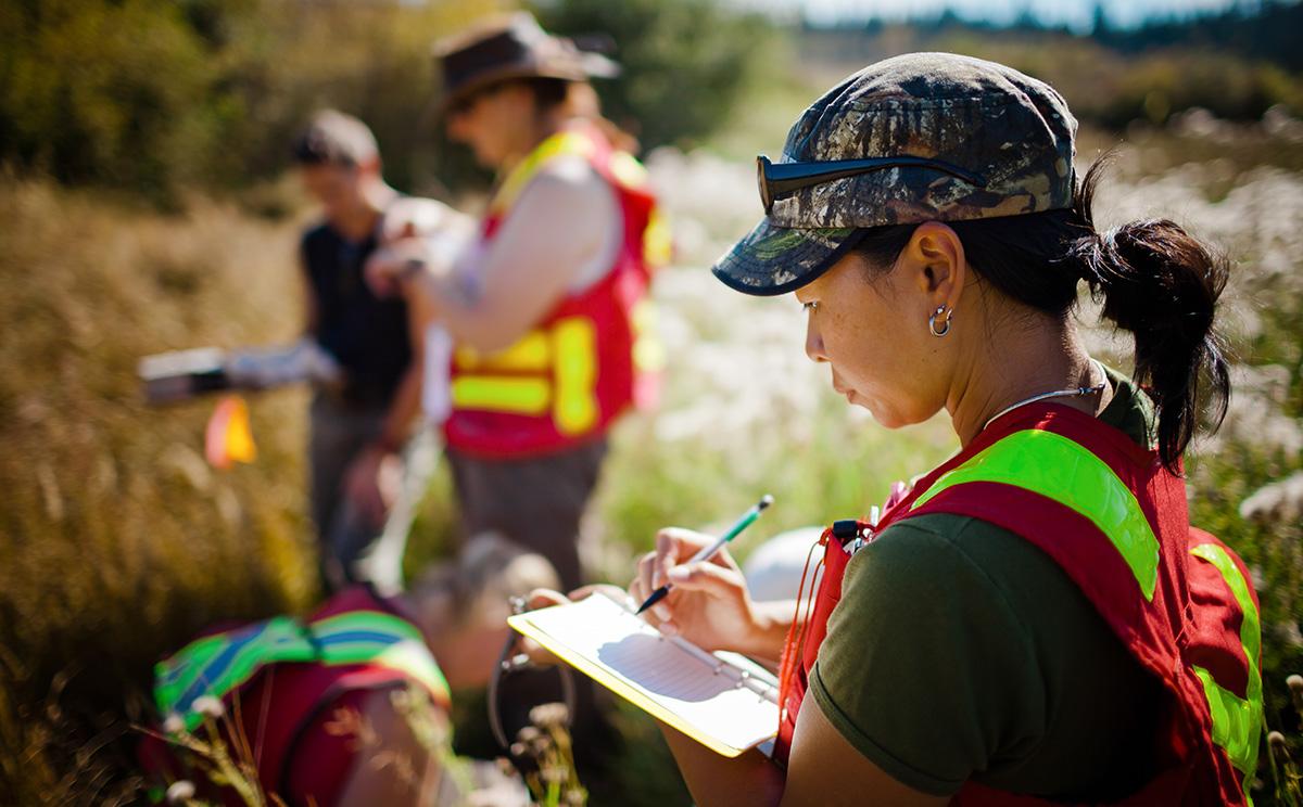 Environmental Science Program at Minneapolis Collge woman writing clipboard