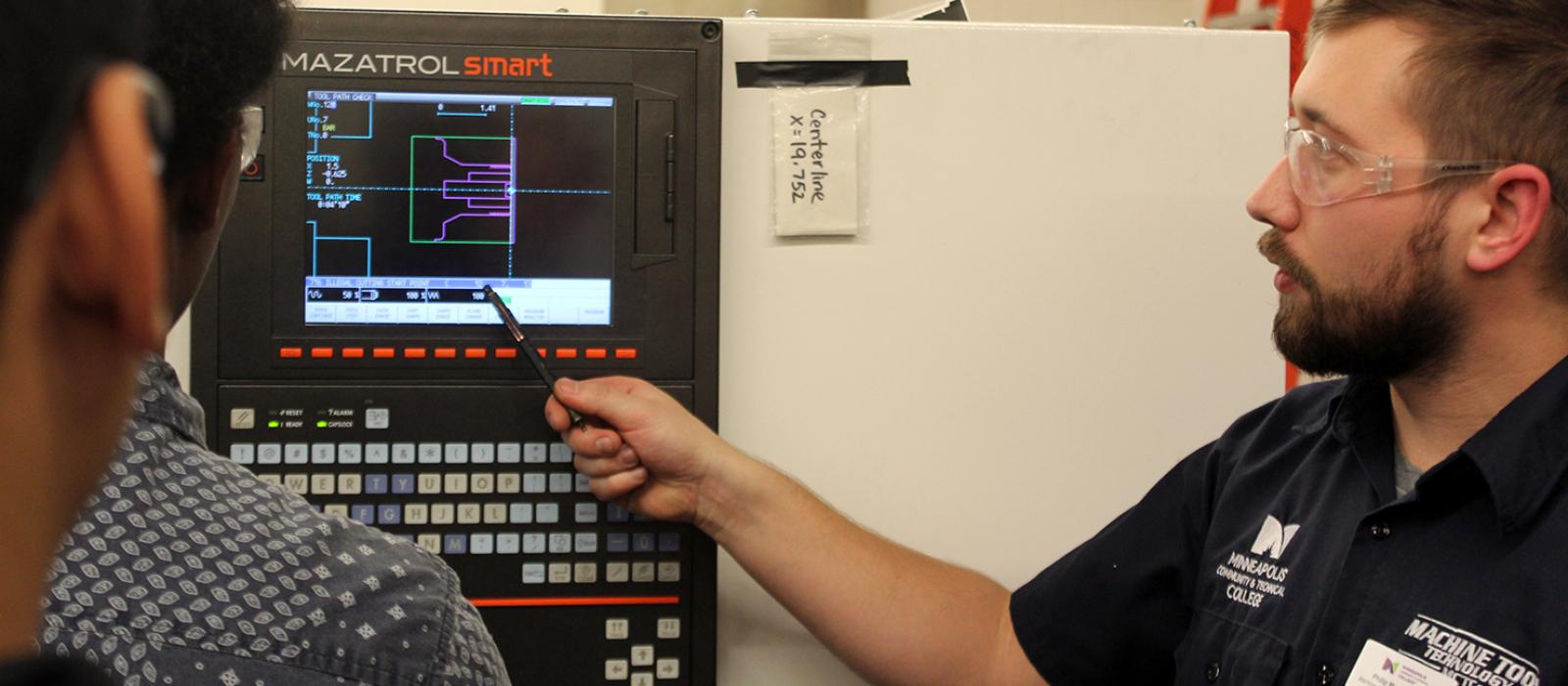 CNC Instructor with Students CNC Instructor with Students