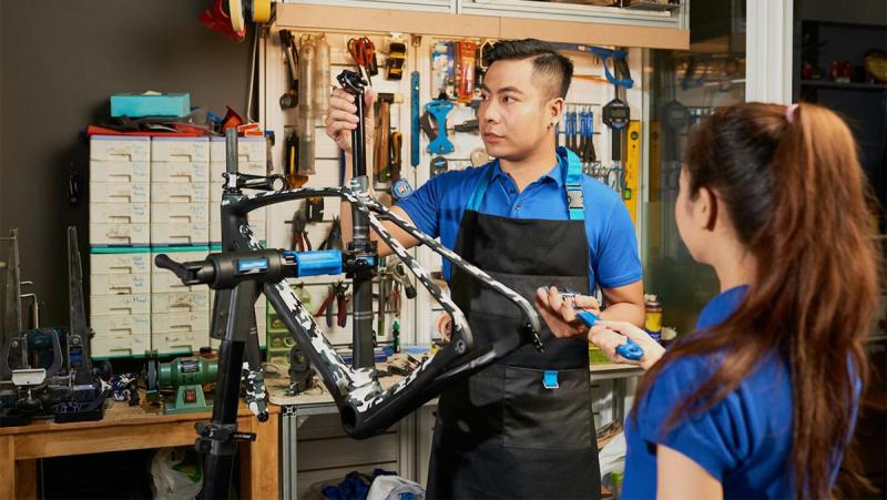 Students repairing a bicycle