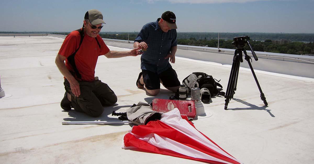 Rod Martel with Randy Johnson 2 men on a roof