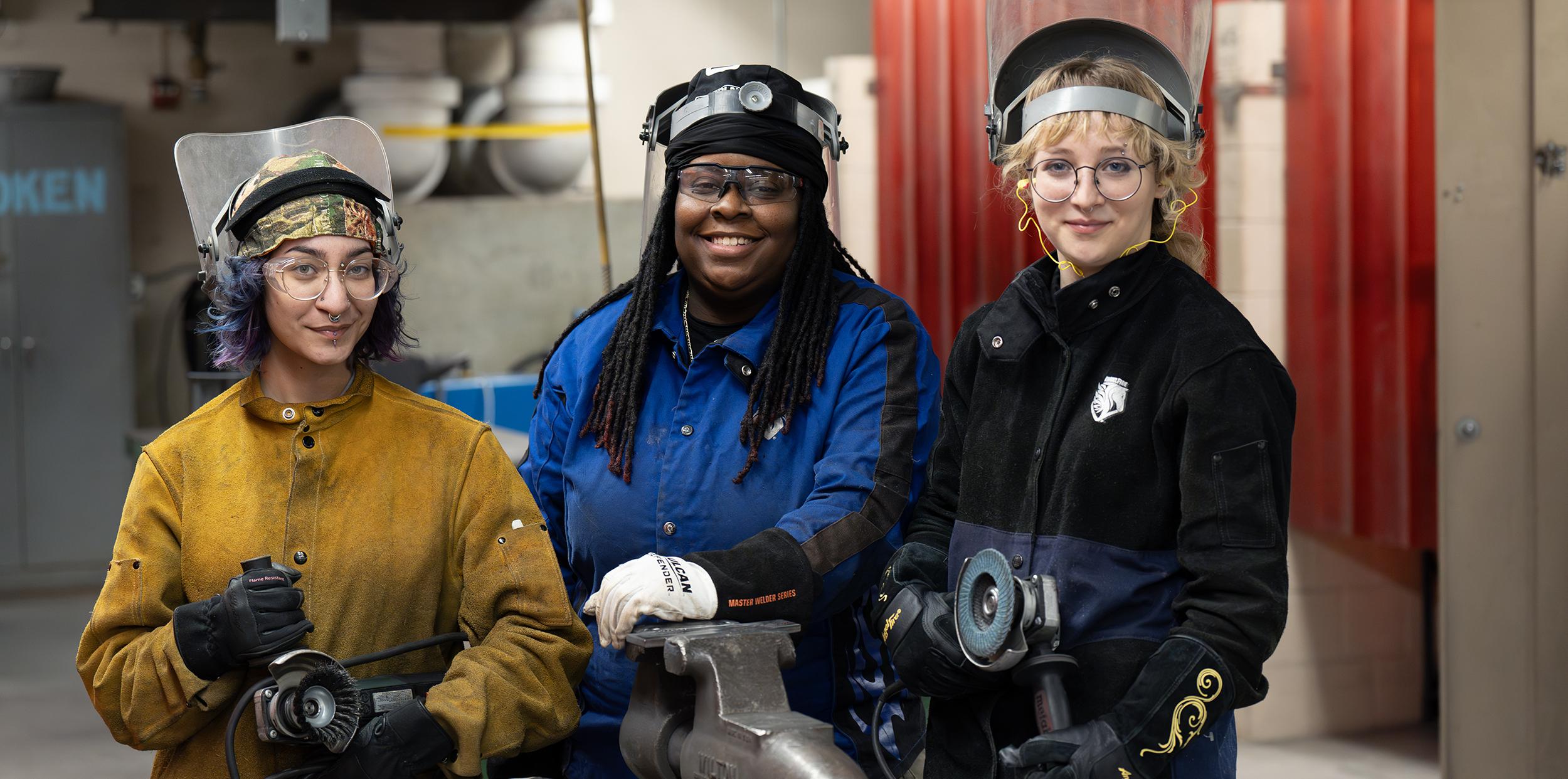 Three women student welders