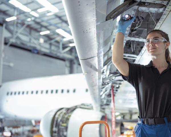 Women working on an airplane 