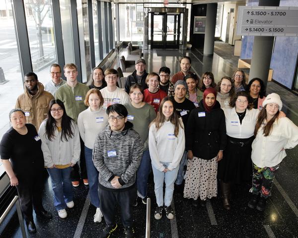 A large group of NSF Scholars gathered in the Science Center lobby. 