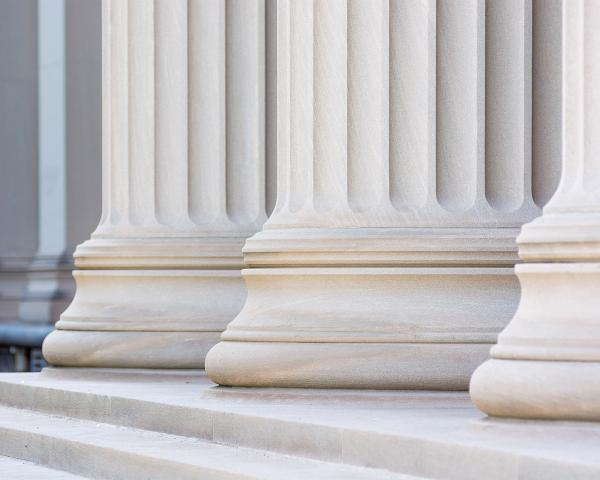 Marble columns above University steps. 