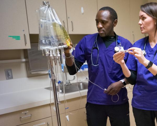 Student with Instructor in the Nursing Program at Minneapolis College Student with Instructor in the Nursing Program at Minneapolis College