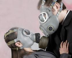 2 people with gas masks
