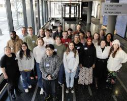 A large group of NSF Scholars gathered in the Science Center lobby. 
