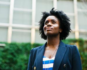 Career Ready Mentorship Program at Minneapolis College woman standing, looking up