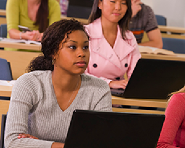 student looking forward sitting in class