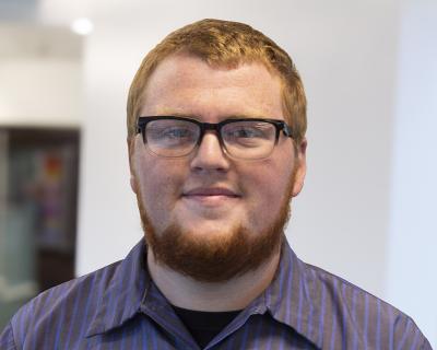 Portrait of Ben Oman.